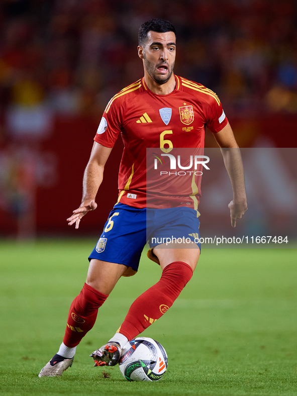 Mikel Merino of Spain is in action during the UEFA Nations League 2024/25 League A Group A4 game between Spain and Denmark at Enrique Roca S...