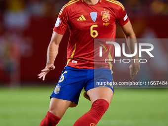 Mikel Merino of Spain is in action during the UEFA Nations League 2024/25 League A Group A4 game between Spain and Denmark at Enrique Roca S...