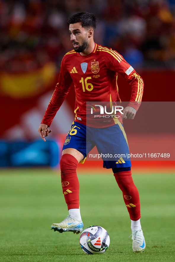 Alex Baena of Spain is in action during the UEFA Nations League 2024/25 League A Group A4 game between Spain and Denmark at Enrique Roca Sta...