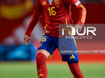 Alex Baena of Spain is in action during the UEFA Nations League 2024/25 League A Group A4 game between Spain and Denmark at Enrique Roca Sta...