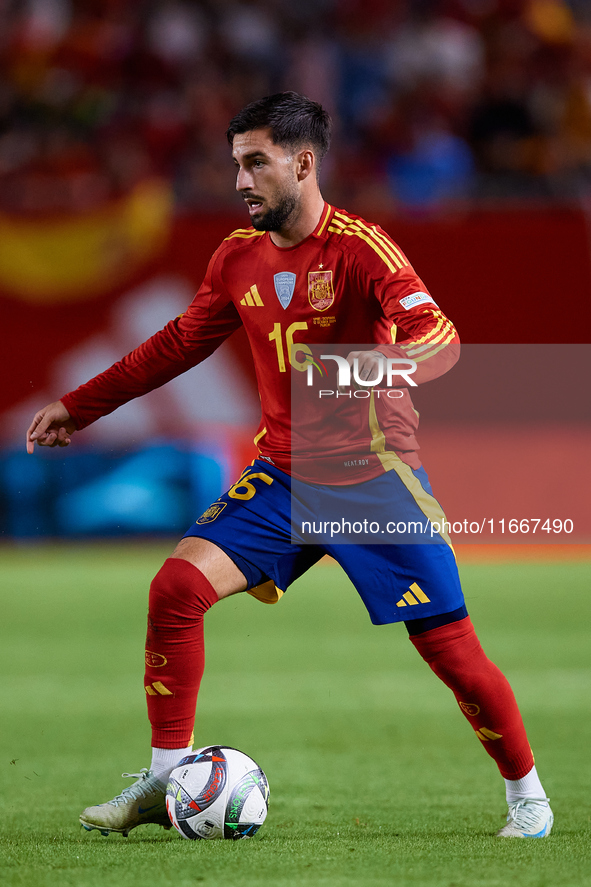 Alex Baena of Spain is in action during the UEFA Nations League 2024/25 League A Group A4 game between Spain and Denmark at Enrique Roca Sta...