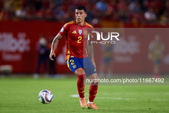 Pedro Porro of Spain plays during the UEFA Nations League 2024/25 League A Group A4 game between Spain and Denmark at Enrique Roca Stadium i...