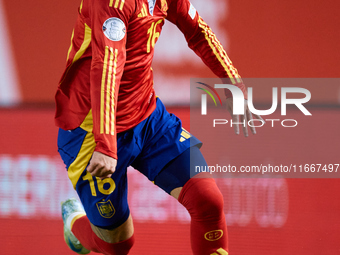 Alex Baena of Spain is in action during the UEFA Nations League 2024/25 League A Group A4 game between Spain and Denmark at Enrique Roca Sta...