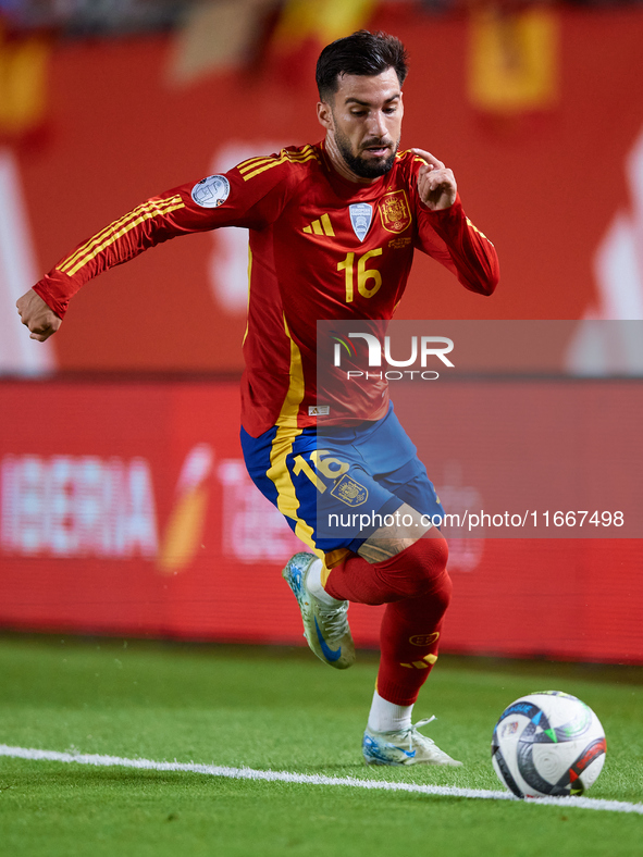 Alex Baena of Spain is in action during the UEFA Nations League 2024/25 League A Group A4 game between Spain and Denmark at Enrique Roca Sta...