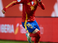 Alex Baena of Spain is in action during the UEFA Nations League 2024/25 League A Group A4 game between Spain and Denmark at Enrique Roca Sta...