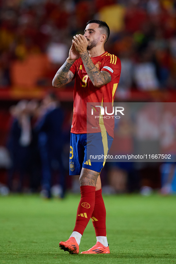 Joselu of Spain applauds during the UEFA Nations League 2024/25 League A Group A4 game between Spain and Denmark at Enrique Roca Stadium in...