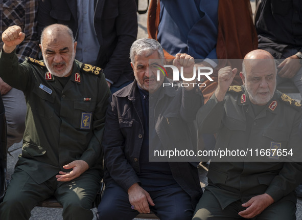 Hossein Salami, commander-in-chief of the Islamic Revolutionary Guard Corps (IRGC), and two other IRGC commanders shout anti-U.S. and anti-I...