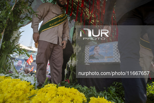 A truck carries a coffin containing the body of Abbas Nilforoushan, a commander of the Islamic Revolutionary Guard Corps' (IRGC) Quds Force,...