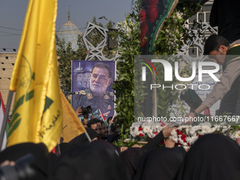 A banner features a portrait of Abbas Nilforoushan, a commander of the Islamic Revolutionary Guard Corps' (IRGC) Quds Force, who is killed i...