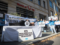 Singer Sarah Connor lies in a mini-aquarium and protests with PETA activists in front of a TUI travel agency for the release of orca whales...