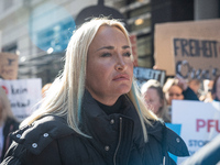 Singer Sarah Connor lies in a mini-aquarium and protests with PETA activists in front of a TUI travel agency for the release of orca whales...