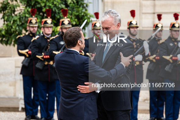 President of the French Republic Emmanuel Macron receives Lithuanian President Gitanas Nauseda at the Elysee Palace in Paris, France, on Oct...