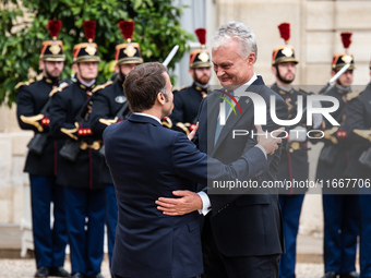 President of the French Republic Emmanuel Macron receives Lithuanian President Gitanas Nauseda at the Elysee Palace in Paris, France, on Oct...