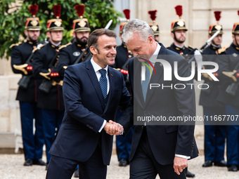 President of the French Republic Emmanuel Macron receives Lithuanian President Gitanas Nauseda at the Elysee Palace in Paris, France, on Oct...