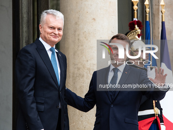 President of the French Republic Emmanuel Macron receives Lithuanian President Gitanas Nauseda at the Elysee Palace in Paris, France, on Oct...