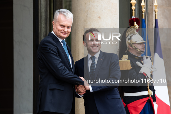 President of the French Republic Emmanuel Macron receives Lithuanian President Gitanas Nauseda at the Elysee Palace in Paris, France, on Oct...