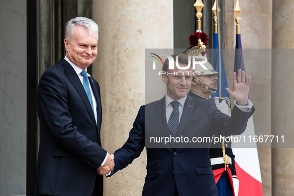 President of the French Republic Emmanuel Macron receives Lithuanian President Gitanas Nauseda at the Elysee Palace in Paris, France, on Oct...