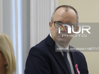 Polish Minister of Justice Adam Bodnar looks on as he arrives at the weekly Ministerial meeting in Warsaw, Poland, on October 15, 2024. (