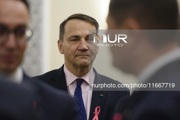 Polish Minister of Foreign Affairs Radoslaw Sikorski looks on as he arrives at the weekly ministerial meeting in Warsaw, Poland, on October...