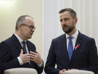 Polish Justice Minister Adam Bodnar and Polish Deputy Prime Minister and Defence Minister Wladyslaw Kosiniak-Kamysza talk as they arrive at...