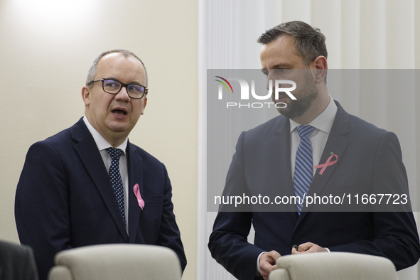 Polish Justice Minister Adam Bodnar and Polish Deputy Prime Minister and Defence Minister Wladyslaw Kosiniak-Kamysza talk as they arrive at...