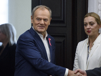 Poland's PM Donald Tusk looks on as he arrives at the weekly Ministerial meeting in Warsaw, Poland, on October 15, 2024. (