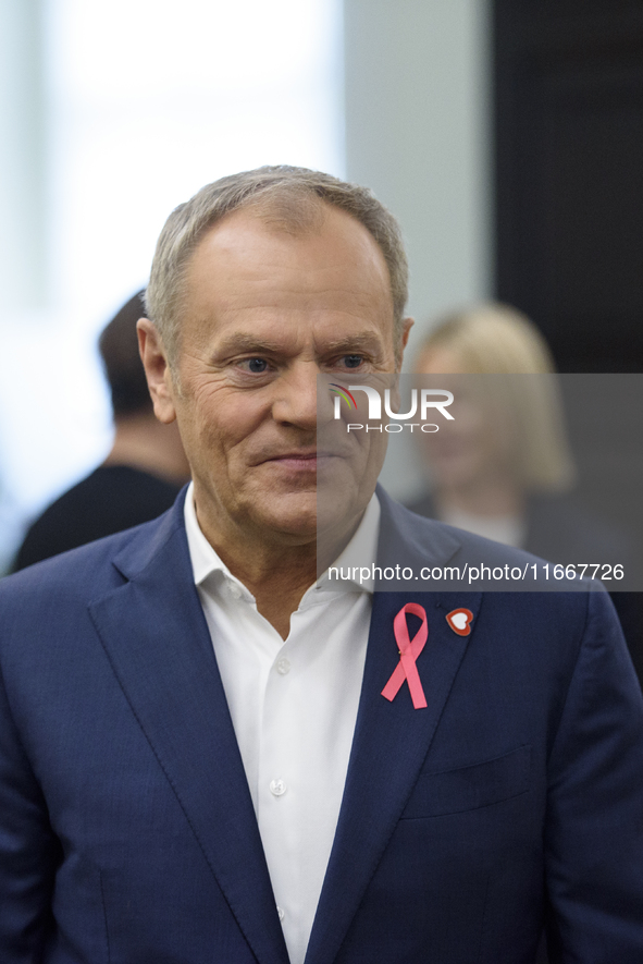 Poland's PM Donald Tusk looks on as he arrives at the weekly Ministerial meeting in Warsaw, Poland, on October 15, 2024. 