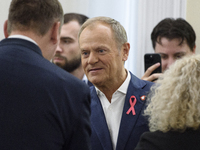 Poland's PM Donald Tusk looks on as he arrives at the weekly Ministerial meeting in Warsaw, Poland, on October 15, 2024. (