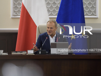 Poland's Prime Minister Donald Tusk gestures as he takes part in the weekly Ministerial meeting in Warsaw, Poland, on October 15, 2024. (