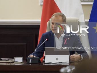 Poland's Prime Minister Donald Tusk gestures as he takes part in the weekly Ministerial meeting in Warsaw, Poland, on October 15, 2024. (