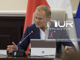 Poland's Prime Minister Donald Tusk gestures as he takes part in the weekly Ministerial meeting in Warsaw, Poland, on October 15, 2024. (