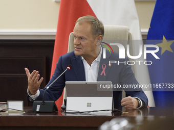 Poland's Prime Minister Donald Tusk gestures as he takes part in the weekly Ministerial meeting in Warsaw, Poland, on October 15, 2024. (