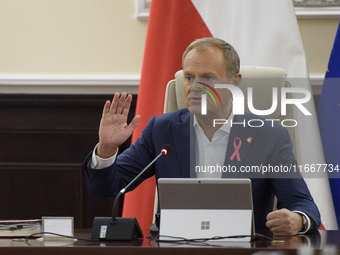 Poland's Prime Minister Donald Tusk gestures as he takes part in the weekly Ministerial meeting in Warsaw, Poland, on October 15, 2024. (