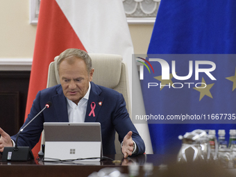 Poland's Prime Minister Donald Tusk gestures as he takes part in the weekly Ministerial meeting in Warsaw, Poland, on October 15, 2024. (