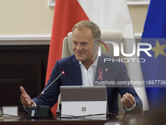 Poland's Prime Minister Donald Tusk gestures as he takes part in the weekly Ministerial meeting in Warsaw, Poland, on October 15, 2024. (