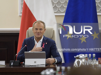 Poland's Prime Minister Donald Tusk gestures as he takes part in the weekly Ministerial meeting in Warsaw, Poland, on October 15, 2024. (