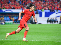 In Qingdao, China, on October 15, 2024, a photo shows Chinese soccer players during their match against Indonesia at home in the 4th round o...