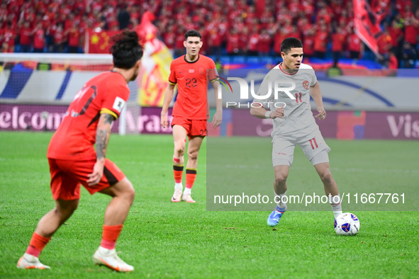 In Qingdao, China, on October 15, 2024, a photo shows Chinese soccer players during their match against Indonesia at home in the 4th round o...