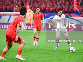 In Qingdao, China, on October 15, 2024, a photo shows Chinese soccer players during their match against Indonesia at home in the 4th round o...