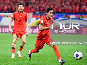 In Qingdao, China, on October 15, 2024, a photo shows Chinese soccer players during their match against Indonesia at home in the 4th round o...