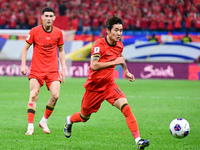 In Qingdao, China, on October 15, 2024, a photo shows Chinese soccer players during their match against Indonesia at home in the 4th round o...