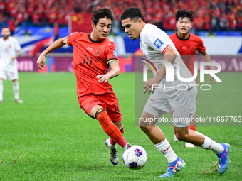 In Qingdao, China, on October 15, 2024, a photo shows Chinese soccer players during their match against Indonesia at home in the 4th round o...