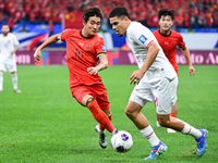 In Qingdao, China, on October 15, 2024, a photo shows Chinese soccer players during their match against Indonesia at home in the 4th round o...