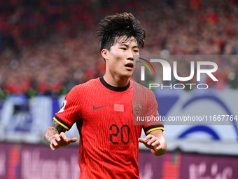 In Qingdao, China, on October 15, 2024, a photo shows Chinese soccer players during their match against Indonesia at home in the 4th round o...