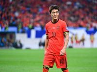 In Qingdao, China, on October 15, 2024, a photo shows Chinese soccer players during their match against Indonesia at home in the 4th round o...