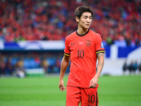 In Qingdao, China, on October 15, 2024, a photo shows Chinese soccer players during their match against Indonesia at home in the 4th round o...