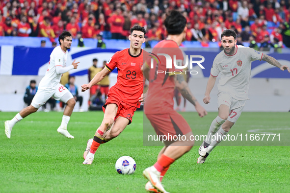 In Qingdao, China, on October 15, 2024, a photo shows Chinese soccer players during their match against Indonesia at home in the 4th round o...