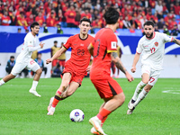 In Qingdao, China, on October 15, 2024, a photo shows Chinese soccer players during their match against Indonesia at home in the 4th round o...