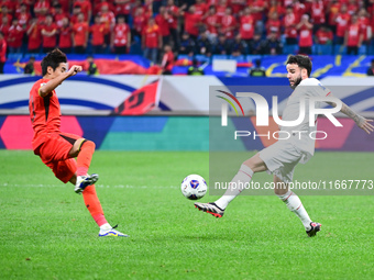 In Qingdao, China, on October 15, 2024, a photo shows Chinese soccer players during their match against Indonesia at home in the 4th round o...