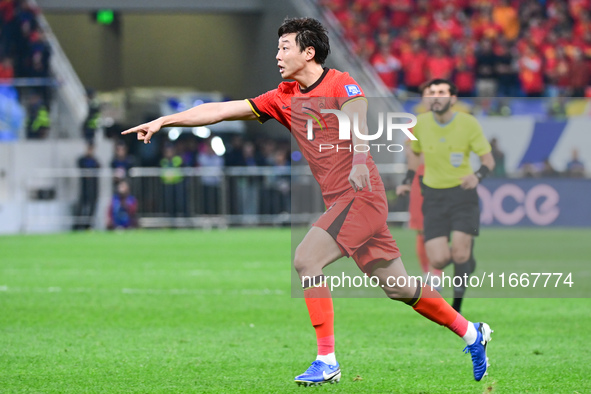 In Qingdao, China, on October 15, 2024, a photo shows Chinese soccer players during their match against Indonesia at home in the 4th round o...